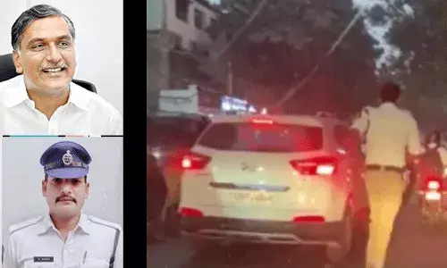 ట్రాఫిక్ పోలీస్ని మెచ్చిన మంత్రి హరీష్ రావు ట్రాఫిక్ పోలీస్ని మెచ్చిన మంత్రి హరీష్ రావు