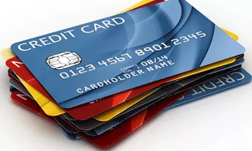 క్రెడిట్, డెబిట్ కార్డులు వాడేవారికి ఆర్‌బీఐ గుడ్‌న్యూస్..