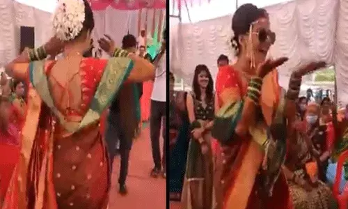 మోడర్న్ పెళ్లికూతురు.. డ్యాన్స్ చేస్తూ కళ్యాణమంటపంలోకి.. వీడియో వైరల్ మోడర్న్ పెళ్లికూతురు.. డ్యాన్స్ చేస్తూ కళ్యాణమంటపంలోకి.. వీడియో వైరల్