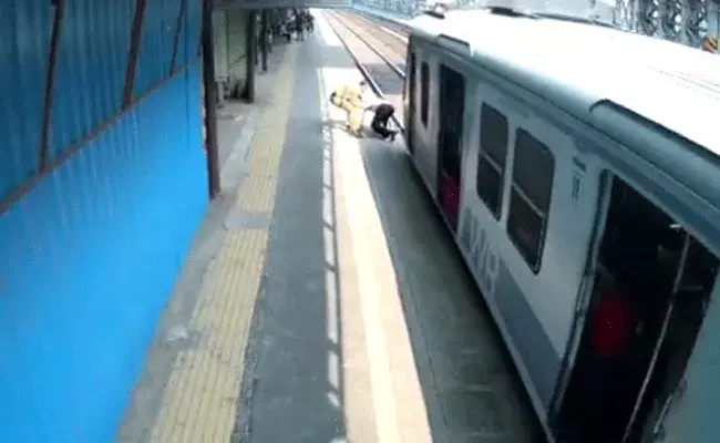 రెప్పపాటు కాలం.. వేగంగా వస్తున్న రైలు కింద..