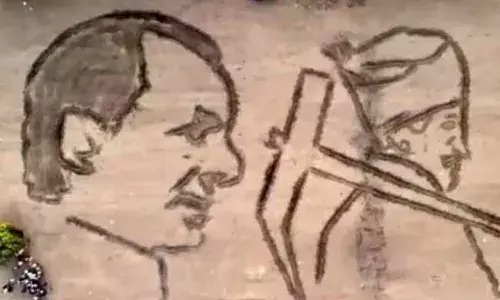 హాలియాలో నేలపై తెలంగాణ సీఎం అద్భుత చిత్రపటం..! హాలియాలో నేలపై తెలంగాణ సీఎం అద్భుత చిత్రపటం..!