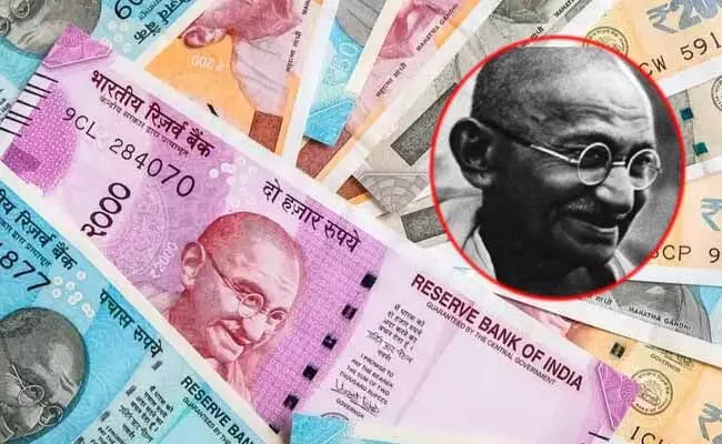 భారత కరెన్సీపై గాంధీ నవ్వుతున్న చిత్రం ఎలా దొరికిందో తెలుసా..? భారత కరెన్సీపై గాంధీ నవ్వుతున్న చిత్రం ఎలా దొరికిందో తెలుసా..?