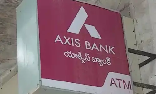 Axis Bank : ఏటీఎం చోరీకి విఫలయత్నం.. పోలీసులకు చిక్కి కటకటాలపాలు..!