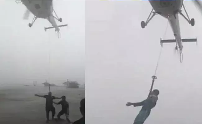 Heavy rains: వరద మధ్యలో16 మంది..హెలికాప్టర్ రాకపోయ్యుంటే ఏమయ్యేదో..