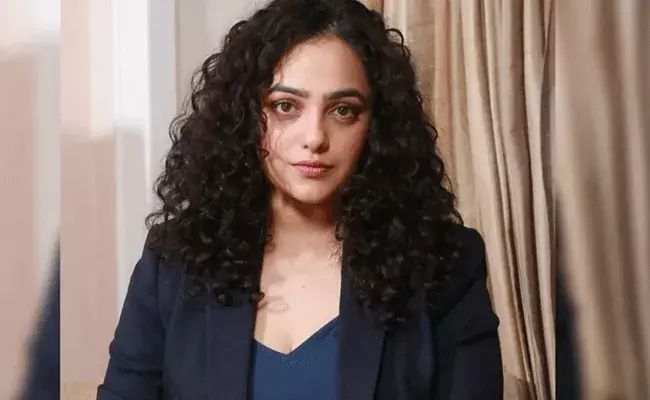Nithya Menen: బ్రేక్ తీసుకుంటున్నాను కానీ పెళ్లి కోసం కాదు: నిత్యా మీనన్ Nithya Menen: బ్రేక్ తీసుకుంటున్నాను కానీ పెళ్లి కోసం కాదు: నిత్యా మీనన్