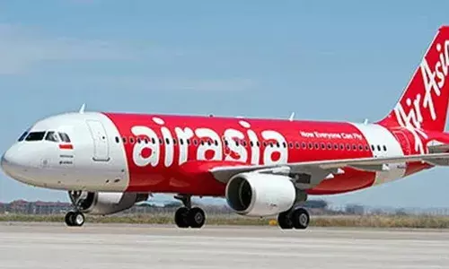 ఎయిర్ ఏషియాకు రూ.20 లక్షల జరిమానా