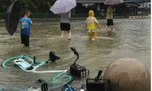 CHINA: చైనాలో వరద బీభత్సం...20మంది మృతి CHINA: చైనాలో వరద బీభత్సం...20మంది మృతి