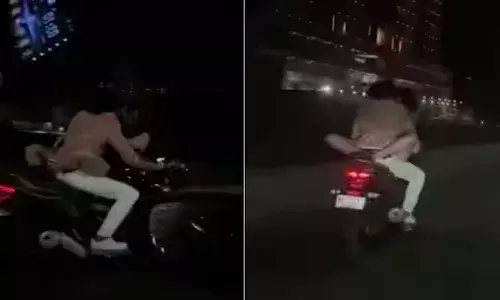 Viral : రొమాంటిక్ రైడ్ వీడియో వైరల్.. అహ్మదాబాద్ వ్యక్తి అరెస్ట్ Viral : రొమాంటిక్ రైడ్ వీడియో వైరల్.. అహ్మదాబాద్ వ్యక్తి అరెస్ట్