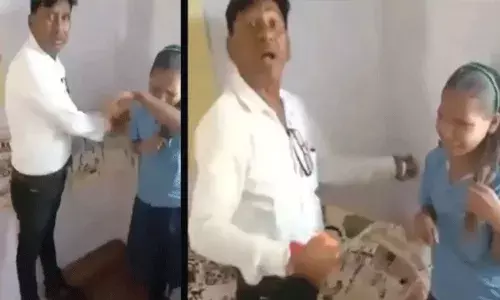 మద్యం మత్తు.. విద్యార్ధిని జుట్టు కత్తిరించిన టీచర్..