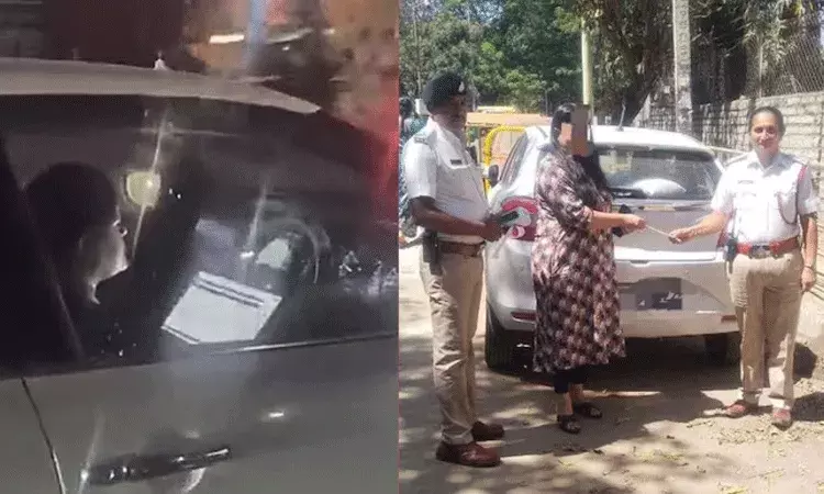 కారు డ్రైవ్ చేస్తూ ఆఫీస్ వర్క్ చేస్తున్న మహిళ.. జరిమానా విధించిన పోలీసులు కారు డ్రైవ్ చేస్తూ ఆఫీస్ వర్క్ చేస్తున్న మహిళ.. జరిమానా విధించిన పోలీసులు