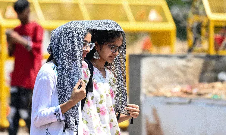 మండుతున్న ఎండలు..  పలు రాష్ట్రాలకు IMD హీట్ వేవ్ హెచ్చరికలు జారీ