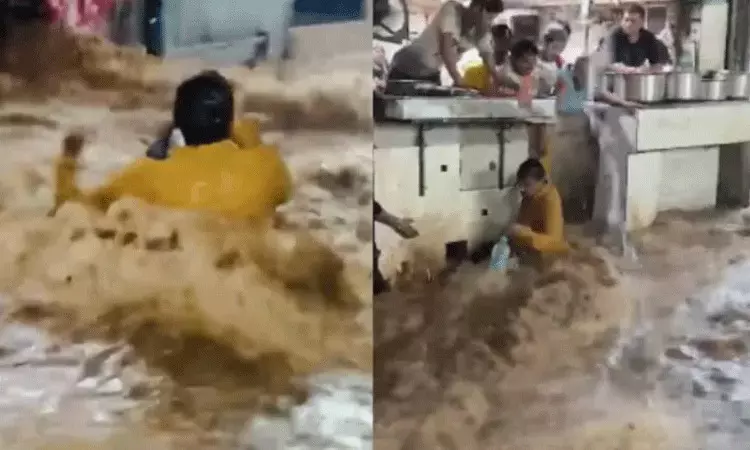 Rajasthan: వరద నీటిలో కొట్టుకుపోతున్న వ్యక్తి.. రక్షించిన హోటల్ సిబ్బంది.. Rajasthan: వరద నీటిలో కొట్టుకుపోతున్న వ్యక్తి.. రక్షించిన హోటల్ సిబ్బంది..